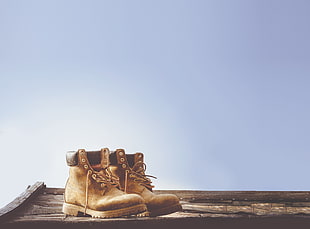 pair of black-and-brown work boots HD wallpaper