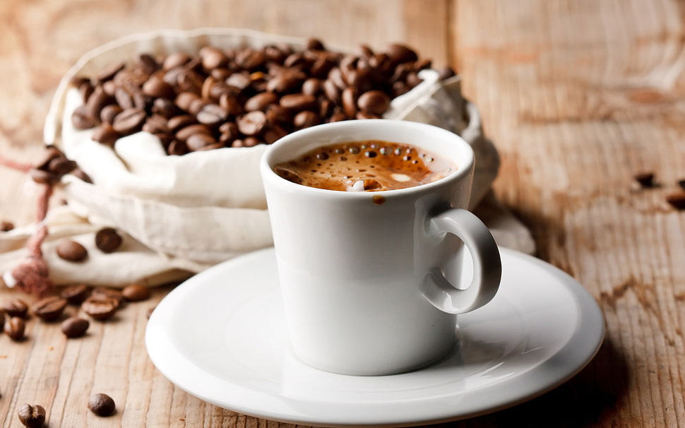 white ceramic cup filled with coffee on white ceramic saucer HD wallpaper
