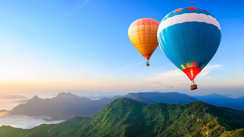 two hot air balloon near mountains during daytime HD wallpaper