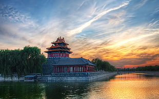 temple landmark in front body of water during day time HD wallpaper