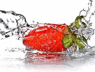 strawberry on water splash HD wallpaper