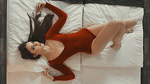woman in red long-sleeved suit