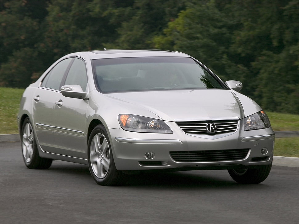silver Acura sedan on the gray pave road in daytime HD wallpaper
