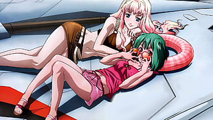 pink and green haired female Macros Frontier characters