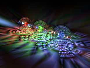 three crystal balls closeup photography