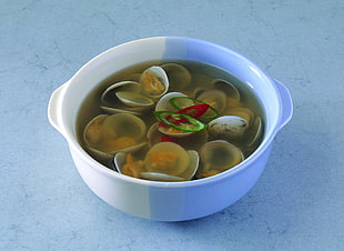 cooked seashell soup on white ceramic bowl