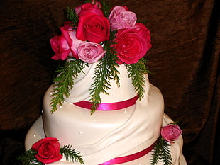 white 3-tier cake with pink roses