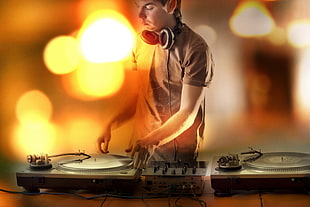 men's gray crew-neck tee shirt and gray corded headphones, DJ