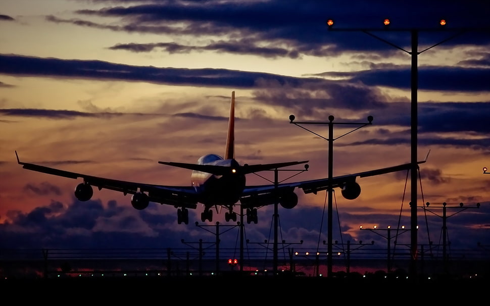 airplane flying during night HD wallpaper