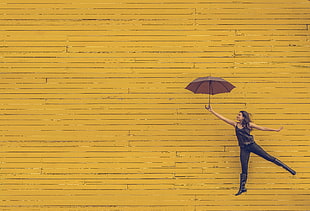 woman in black tank top holding umbrella HD wallpaper