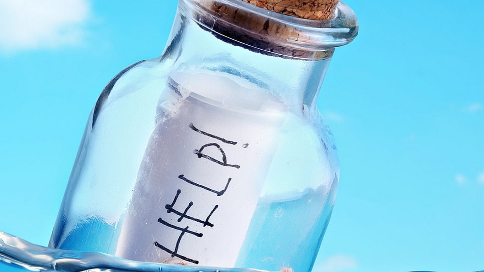 clear glass bottle filled with help printed paper HD wallpaper