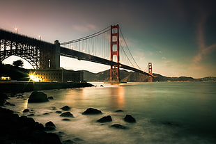 Golden Gate bridge during golden hour HD wallpaper