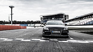 black Audi car on race track