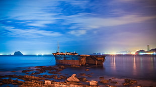 white cruise ship, city, lights, shipwreck HD wallpaper