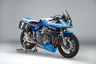 blue and white Suzuki sports bike