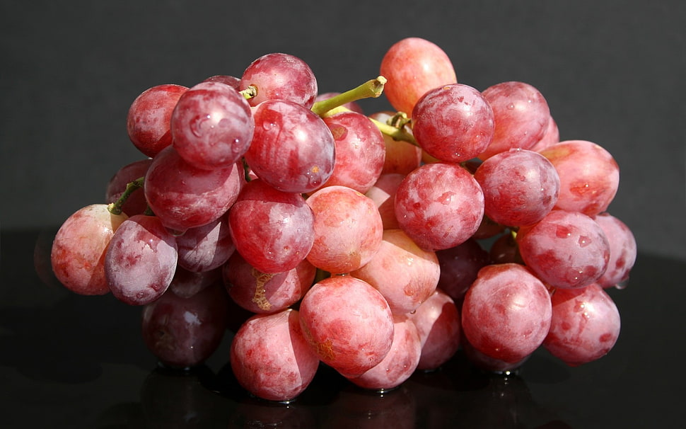 red grapes fruit on black surface HD wallpaper