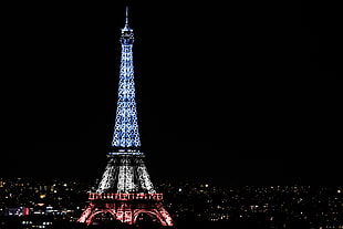 blue, white and red LED light Eiffel tower during nighttime