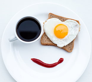 sunny-side-up fried egg and toasted bread, smiling, toasts, eggs, food