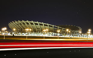 grey stadium and street lamps concept at night