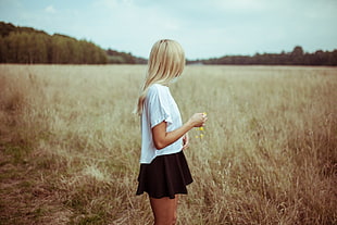 woman standing near grass photography