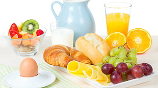 pastries and fruits, breakfast, juice, grapes, eggs