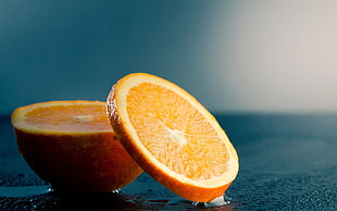 sliced orange fruit HD wallpaper