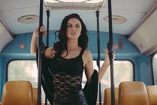 woman wearing black tank sheer top beside bus chair HD wallpaper
