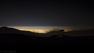 silhouette of mountain peak, night, landscape, horizon, lights