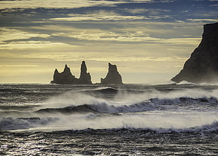 rock islets on sea at daytime, iceland HD wallpaper