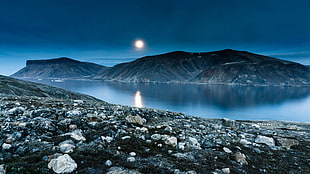 Island Mountain Near Rock Formation during Night Time