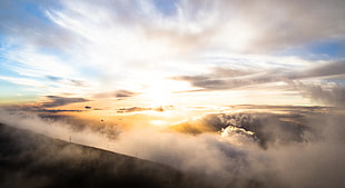 cloudy mountain during sunrise HD wallpaper
