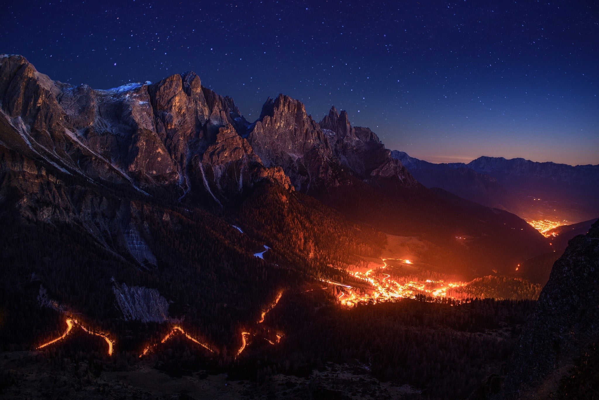 mountain with flowing lava, fire, stars, sky, night