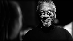 grayscale focus photography of man wearing glasses HD wallpaper