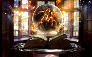 round black and yellow lamp near book photo
