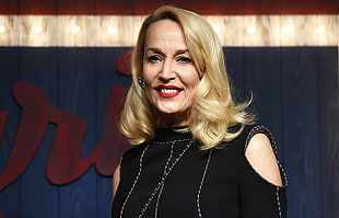 woman wearing black cold-shoulder top