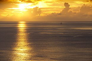 blue ocean and yellow sunset HD wallpaper