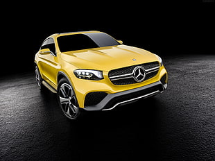 yellow Mercedes-Benz SUV