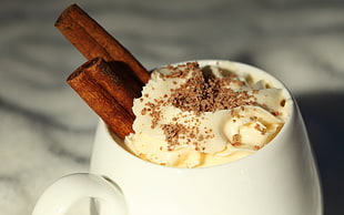 vanilla ice cream with cinnamon sticks