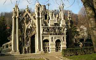 white and beige castle near forest