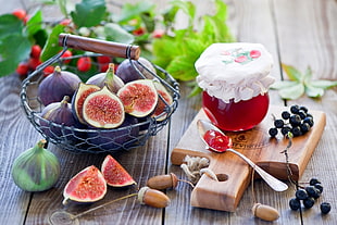 red jam beside basket of fruits HD wallpaper