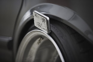 grey car wheel with tire, BMW E28, Squatty