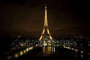 Eiffel Tower during night time HD wallpaper