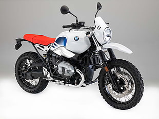 white, red, and blue BMW motorcycle