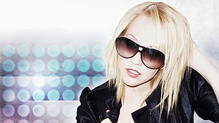 women;s wearing black framed sunglasses