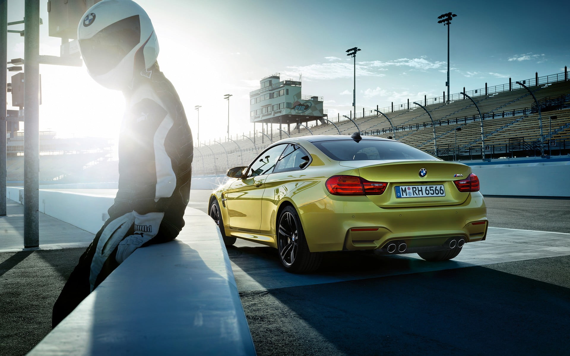 man wearing black and white helmet, BMW M4, yellow