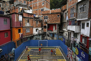 brown and gray wooden cabinet, city, street, soccer, favela