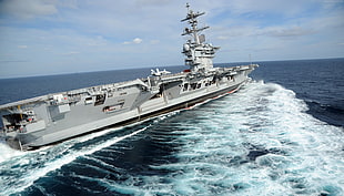 grey battleship on ocean during daytime HD wallpaper