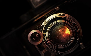 close-up photo of gray and black 2-lens folding camera