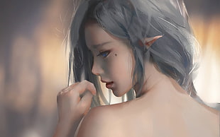 photo of topless woman elf painting
