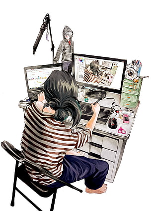 woman sitting facing computer monitor holding pen painting